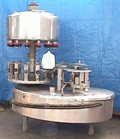 Filler 14 valve Cemac liquid gravity filler 6 centers, up to 35 cpm